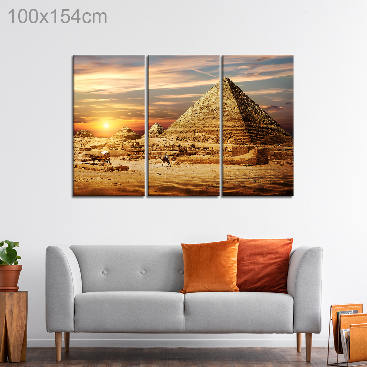 Riding Camels by Pyramids in Egypt