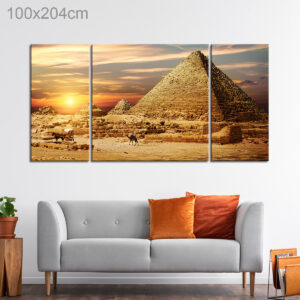 Riding Camels by Pyramids in Egypt