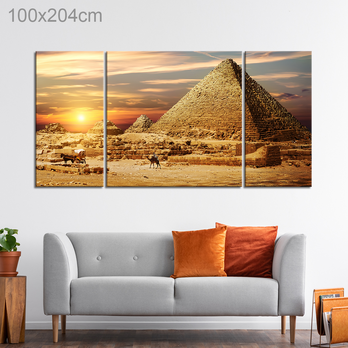 Riding Camels by Pyramids in Egypt